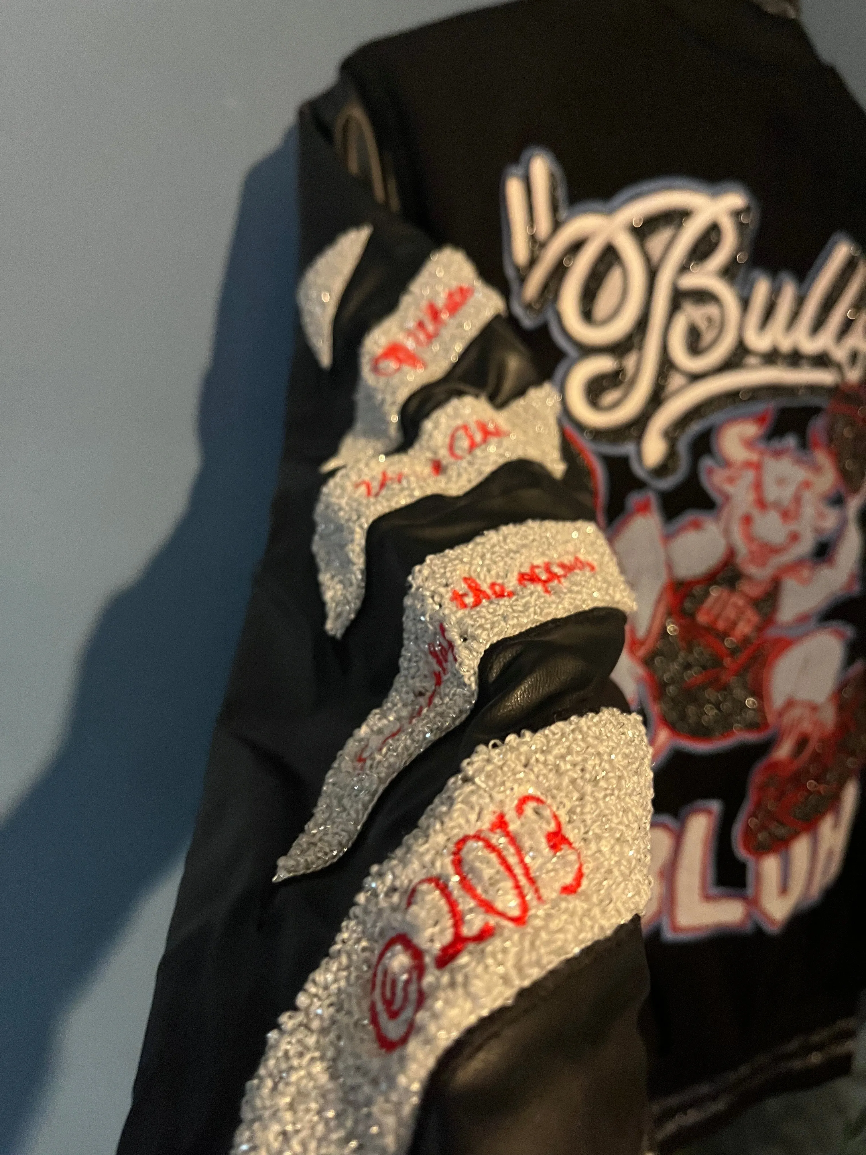 Off-White c/o Chicago Bulls " Red Varsity " Jacket styled in Black for Fall&Winter 2024