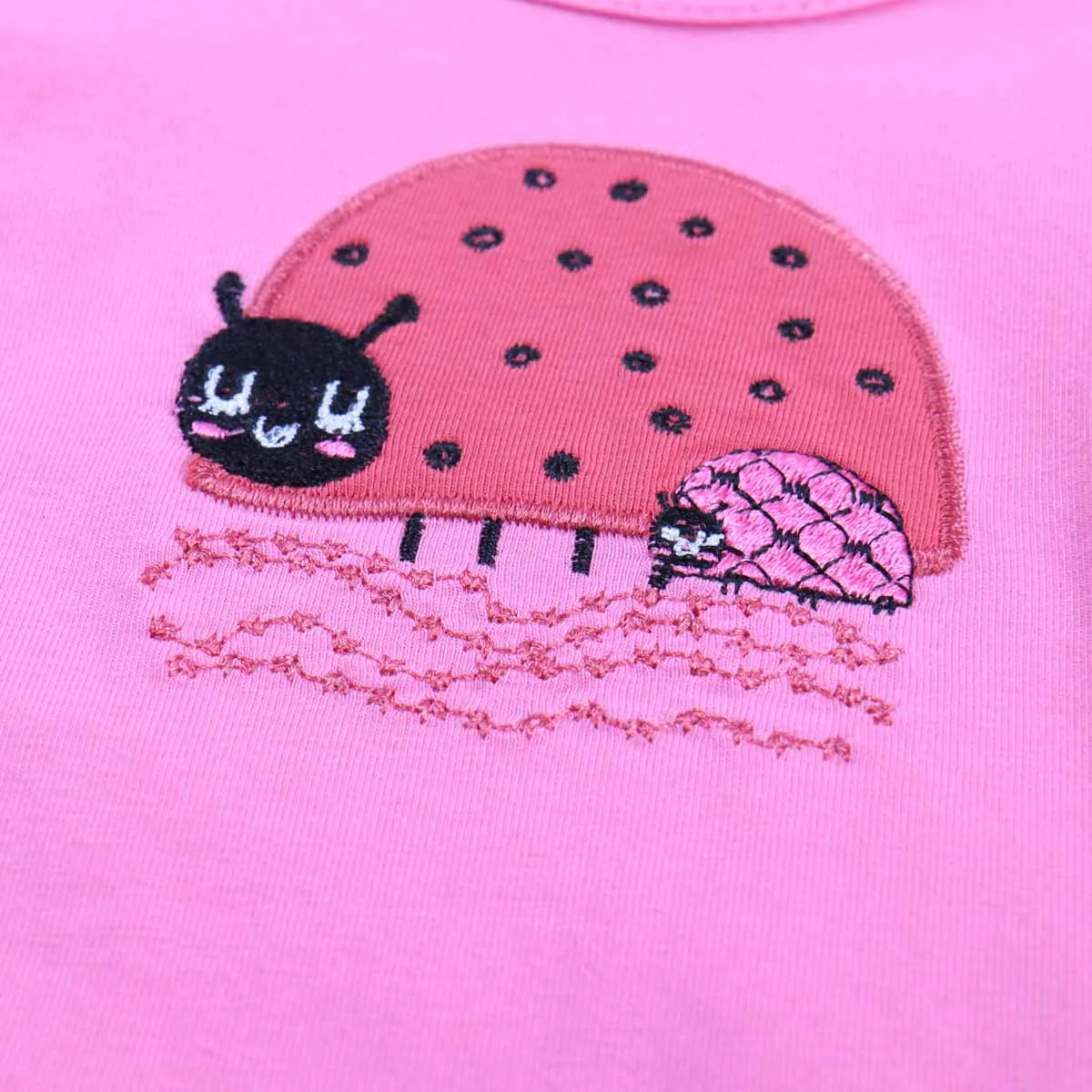 Puff sleeve top- ladybug appliqué